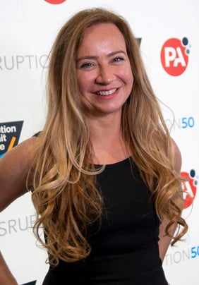headshot of blonde woman with long hair